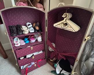 American Girl doll with wardrobe trunk