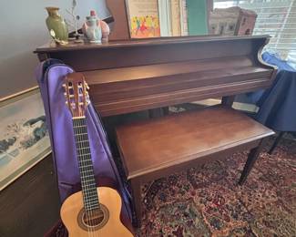 Upright piano and classical guitar