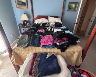 Four-poster bed and clothing