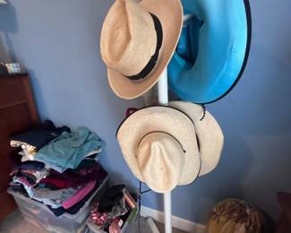 Hat rack with straw hats