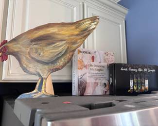 Decorative chicken figure and cake supplies