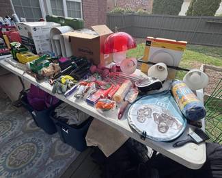 Assorted decorative plates and household items