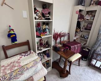 White bookshelf with collectibles