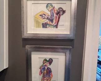 Pair of framed figurative art prints