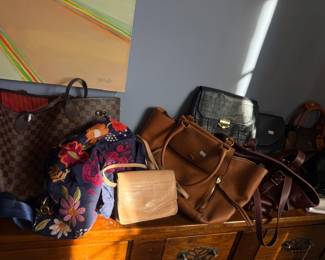 Designer handbag collection, leather totes, crossbody bags, clutches