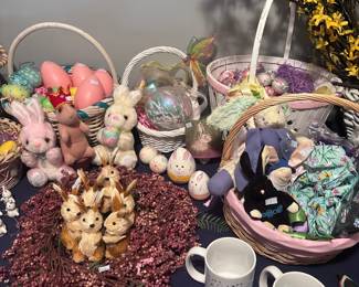 Easter spring decorations, painted eggs, bunny figurines, baskets, forsythia