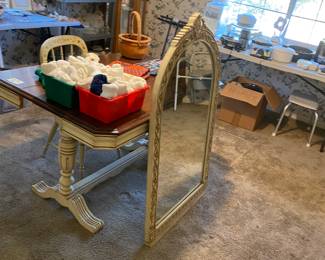 Vintage extendable table, matching mirror and matching single chair. I believe this was in an entryway at one point.