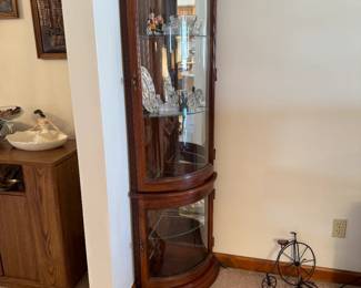 Corner curio is 16x16x68”