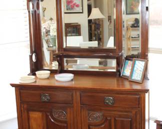 Arts and Crafts period sideboard; four beveled mirrors