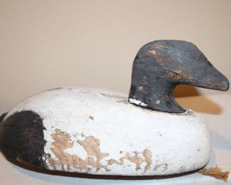 hand-carved decoys, wood or cork