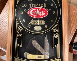 Case dealer display with Saddlehorn knife, gold-plated art on blades