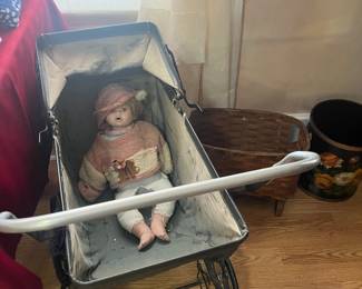 Vintage stroller, doll