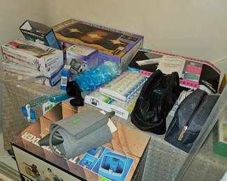 Bathrooms items, foot spa, blood pressure monitor, shaving bags