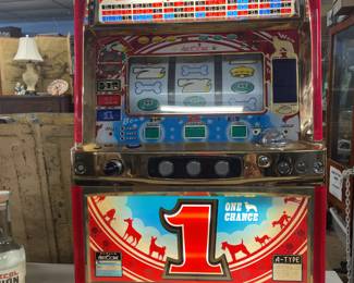 Working slot machine with keys and coins