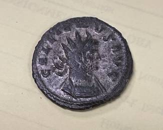 Silver and bronze Roman coin circa third century A.D.