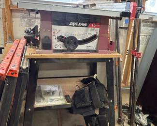 Skilsaw on stand , saw horses 