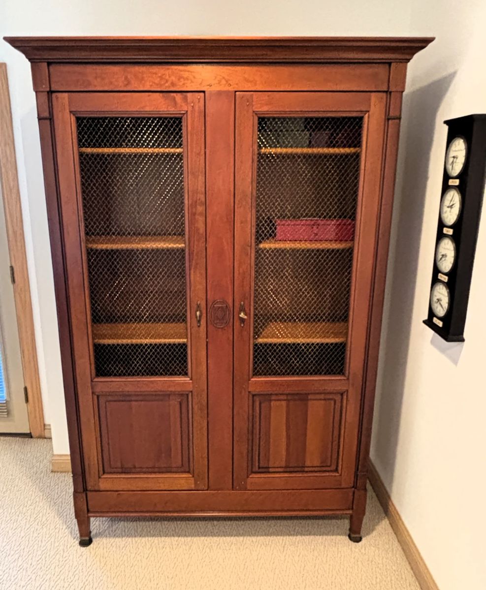 BUY IT NOW! $750.00.  Call Jan at 314 960-5700.            Lucien  Ducroix  Wire Door Cabinet.                                       54" W x 18" D x 78 1/2" H