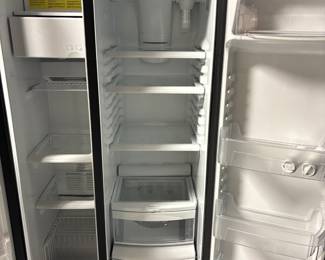 BUY IT NOW! $750.00. Call Jan at 314 960-5700. GE Side by side refrigerator/freezer, counter depth, 27" D. 21.9 cu. ft. Model #GZS22DGJXFBB
