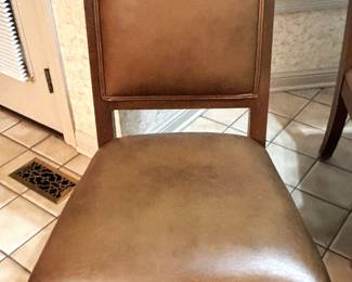 Four Ethan Allen leather & wood chairs.  