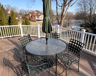 BUY IT NOW! $375.00 each. Call Jan at 314 960-5700. Brown Jordan glass top w/umbrella & stand. 50" round x 30" H.