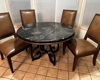 Drexel Heritage Marble top table.   47" Dia. x 30" H.                                    Ethan Allen leather & wood chairs.  