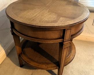 Small round wood table. 24" Dia. x 21 1/2" H.