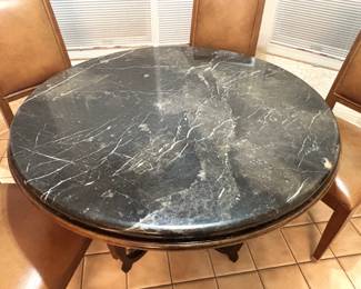 Drexel Heritage Marble top table.   47" Dia. x 30" H.                                    Ethan Allen leather & wood chairs.  