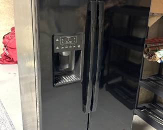 BUY IT NOW! $750.00. Call Jan at 314 960-5700. GE Side by side refrigerator/freezer, counter depth, 27" D. 21.9 cu. ft. Model #GZS22DGJXFBB