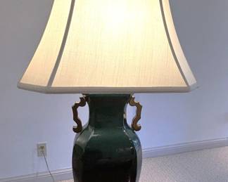 BUY IT NOW! $150.00 Pair. Call Jan at 314 960-5700. Pair of green lamps with handles and brass base.