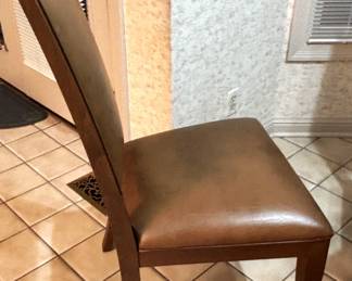 Four Ethan Allen leather & wood chairs.  