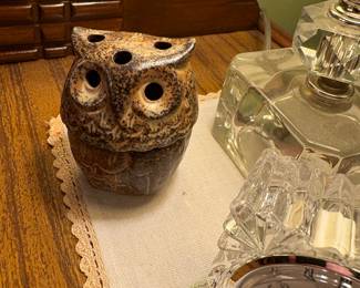 Small owl on dresser in bedroom
