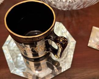 Entrance hallway - items in Curio Cabinet
Cup on mirror 