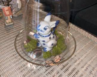Rabbit under glass in living room 