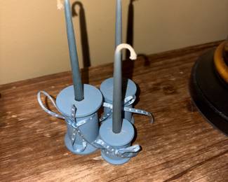 Candles deeply embedded in candle holders - set