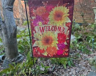 Welcome flag in courtyard 