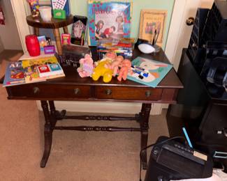 Vintage table in bedroom with toys 