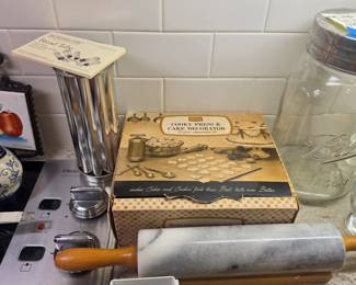 Bread tube, vintage Sears cookie press & decorator, rolling pin 