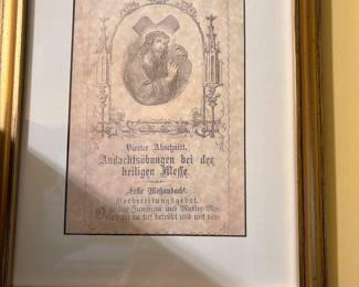 Pictures - on right  side of curio cabinet - entrance 