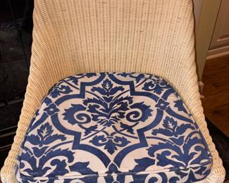 Close up of wicker  chair & cushion 