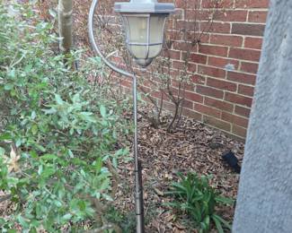 Moveable lantern in courtyard