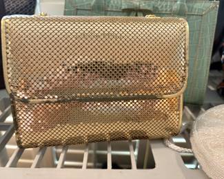 Master bedroom - metallic gold tone clutch purse