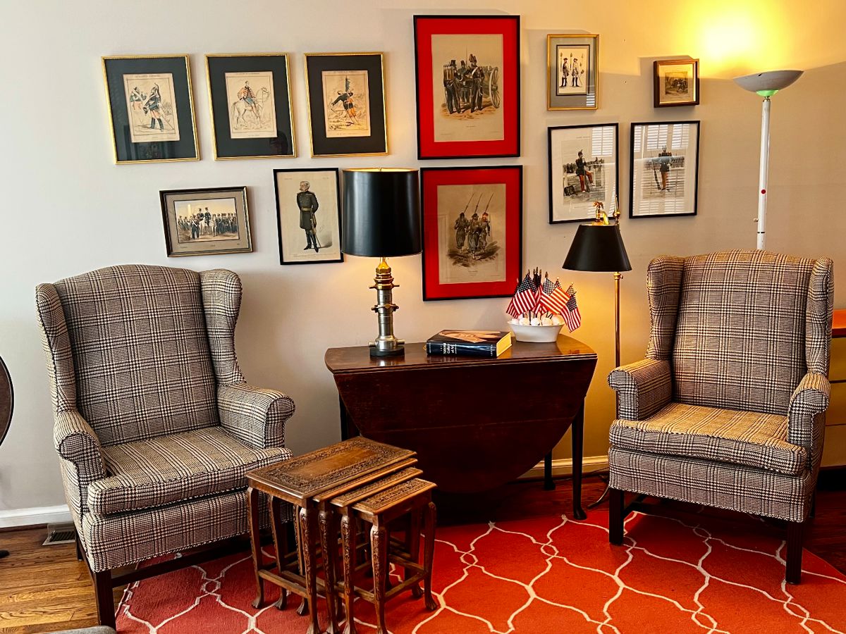 WELCOME...HERE WE HAVE A HANDSOME COLLAGE OF MILITARY PRINTS AND TWO TRADITIONAL WINGBACKS