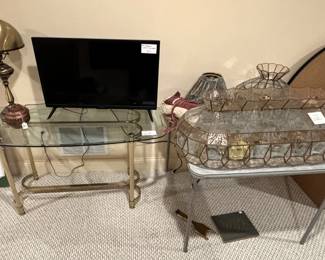 Glass top table, 32" Insignia led TV(not smart), hanging light fixture.