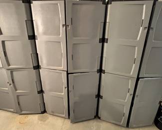 Large plastic storage cabinets with shelves.