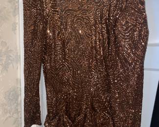 FABULOUS Clothing Collection Featuring Many Vintage Pieces From The 1980s Like.....Western Wear, Velvet Smoking Jackets, Corduroy Pants, Colorful Pant Suits, Snakeskin Sweaters, Rhinestoned & Bedazzled Blazers, Bell Bottom Dresses, Etc.