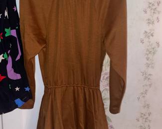 FABULOUS Clothing Collection Featuring Many Vintage Pieces From The 1980s Like.....Western Wear, Velvet Smoking Jackets, Corduroy Pants, Colorful Pant Suits, Snakeskin Sweaters, Rhinestoned & Bedazzled Blazers, Bell Bottom Dresses, Etc.