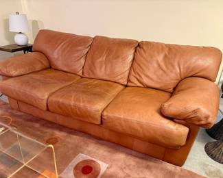Leather three cushion sofa