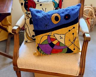 Regency style armchair; Pillows fashioned after Joan Miro