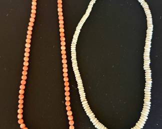 Pink coral and puka shell necklaces