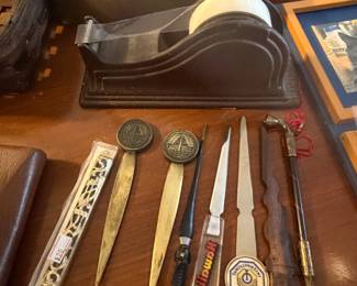 tons of letter openers, vintage tape dispensers